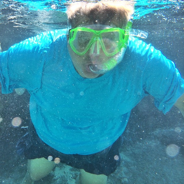 Dad is finally relaxing into Hawaii and snorkels.