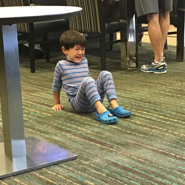 Random young boy throwing a fit and refusing to get off the floor at breakfast in #chicago hotel.