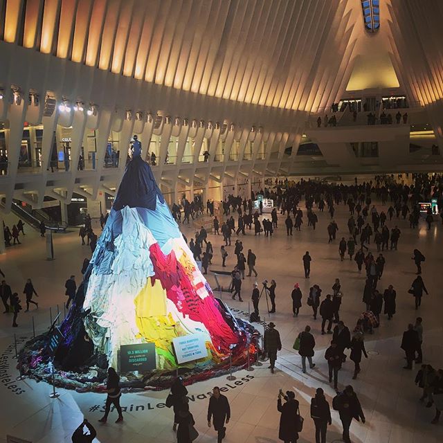 New installation art inside #oculus at #wtc. 5 story dress made from discarded clothes. Not stained. Not torn. Good clothes that could be donated to someone else.