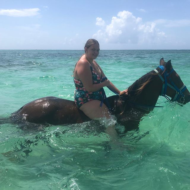 Sara on her swimming horse