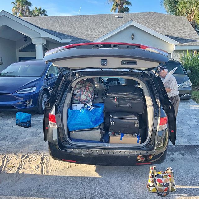 Poppop helps wedge - er put the last items for FL to DC roadtrip.